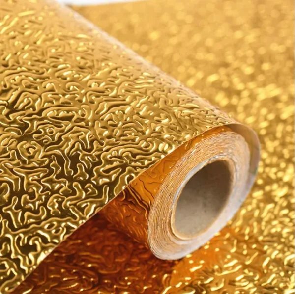 Kitchen Wallpaper Sticker Foil - Shiny gold foil wrapping paper and a roll of gold foil
